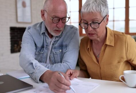 Senior couple doing financial planning at home